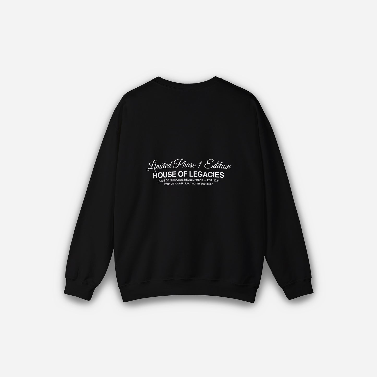 THE SIGNATURE BLACK SWEATER