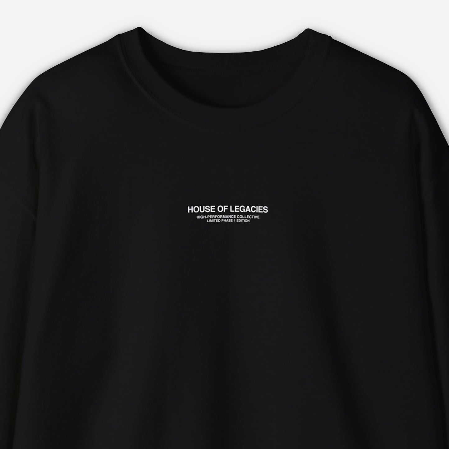 THE ESSENTIALS BLACK SWEATER
