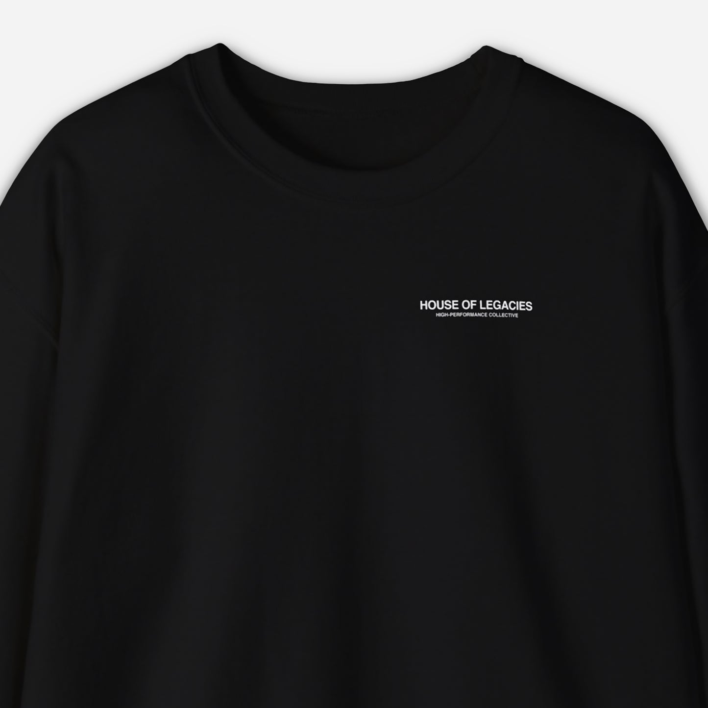 THE SIGNATURE BLACK SWEATER